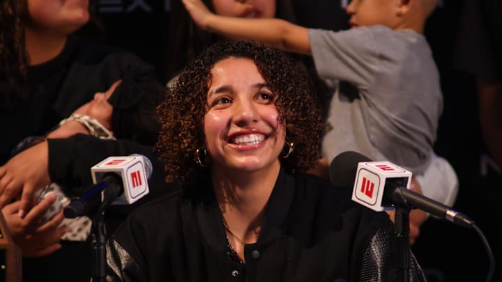 Monterey's Aaliyah Chavez announces she will be playing for the University of Oklahoma in front of an auditorium filled with fans at Monterey High School on Tuesday, March 25, 2025 in Lubbock, Texas.