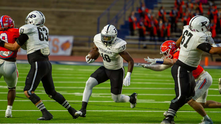 Odessa Permian's Gavin Black (18) runs with the ball against San Angelo Central at San Angelo Stadium on Friday, Oct. 18, 2024.