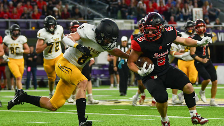 ROCORI football senior Austin Griffith leans into a tackle Nov. 16 in the Class 4A state semifinal football game against Byron. The Spartans won 7-0.