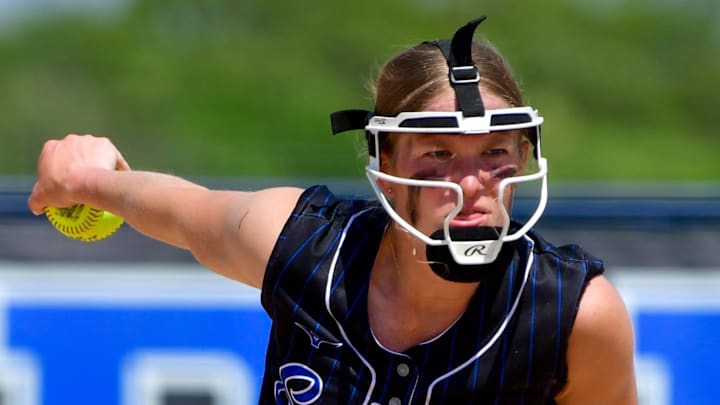 Sartell softball junior Marni Koosmann delivers a pitch during the early game of a double header against Willmar and Moorhead on May 14, 2025 at Sartell High School. The Sabres beat the Cardinals 6-5 in eight innings, but lost to the Spuds 18-7.