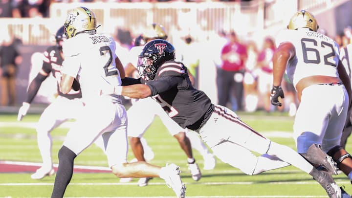 Texas Tech's Romello Height sacks UCF quarterback Tayven Jackson during a Big 12 Conference football game, Saturday, Nov. 15, 2025, at Jones AT&T Stadium. Texas Tech's Romello Height sacks UCF quarterback Tayven Jackson during a Big 12 Conference football game, Saturday, Nov. 15, 2025, at Jones AT&T Stadium.
