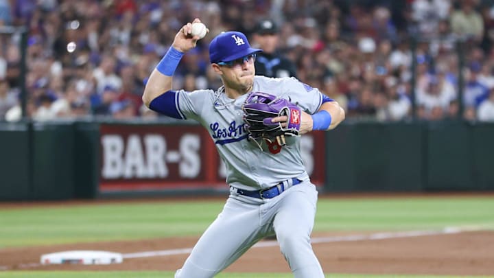 Los Angeles Dodgers infielder Kike Hernandez throws to first on a bunt at Chase Field on Aug. 31, 2024, in Phoenix. Los Angeles Dodgers infielder Kike Hernandez throws to first on a bunt at Chase Field on Aug. 31, 2024, in Phoenix.