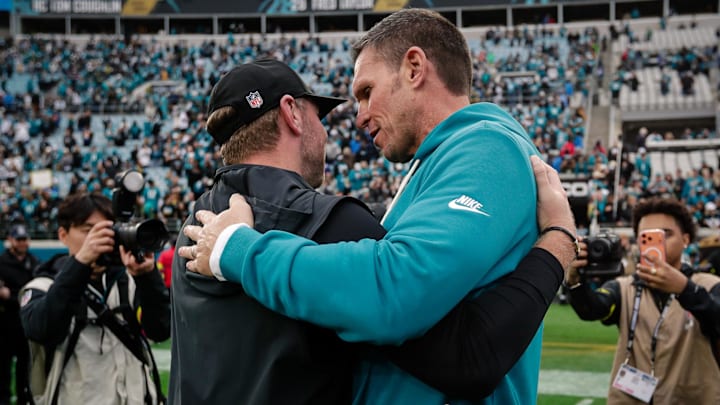 Jan 4, 2026; Jacksonville, Florida, USA; Jacksonville Jaguars executive vice president of football operations Tony Boselli embraces head coach Liam Coen after the game against the Tennessee Titans at EverBank Stadium. Mandatory Credit: Travis Register-Imagn Images Jan 4, 2026; Jacksonville, Florida, USA; Jacksonville Jaguars executive vice president of football operations Tony Boselli embraces head coach Liam Coen after the game against the Tennessee Titans at EverBank Stadium. Mandatory Credit: Travis Register-Imagn Images
