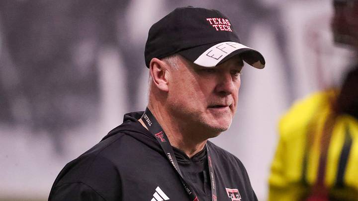 Texas Tech head coach Joey McGuire walks the field during spring football practice