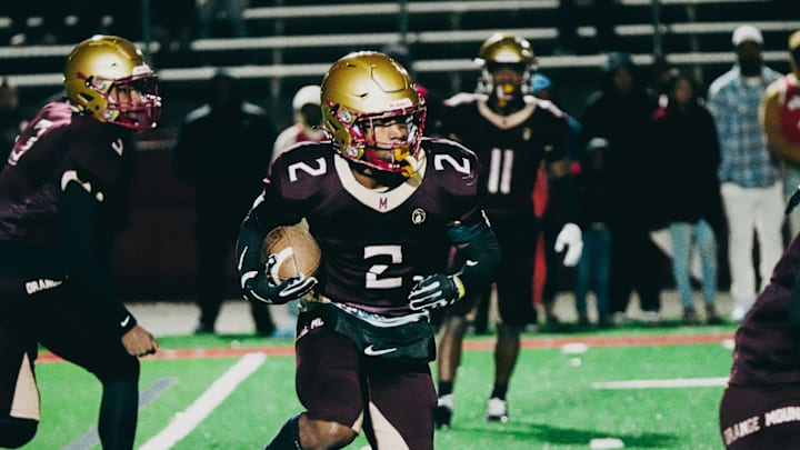 Melrose’s Jamarion Morrow (2) rushes with the ball against Pearl-Cohn during a TSSAA playoff football game on Friday, Nov. 29, 2024 at Melrose Stadium in Memphis, Tenn.