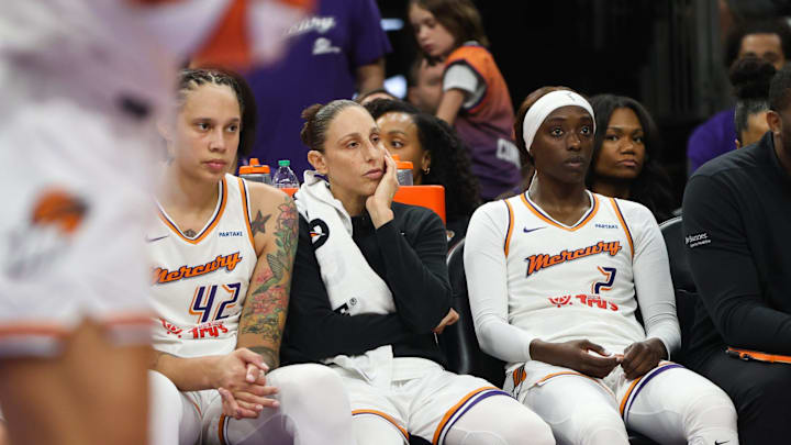 Phoenix Mercury center Brittney Griner (42), Phoenix Mercury guard Diana Taurasi (3) and Phoenix Mercury guard Kahleah Copper (2) sit on the bench during the final minutes of the Mercury loss to the Washington Mystics on Sept. 5, 2024 at Footprint Center in Phoenix.