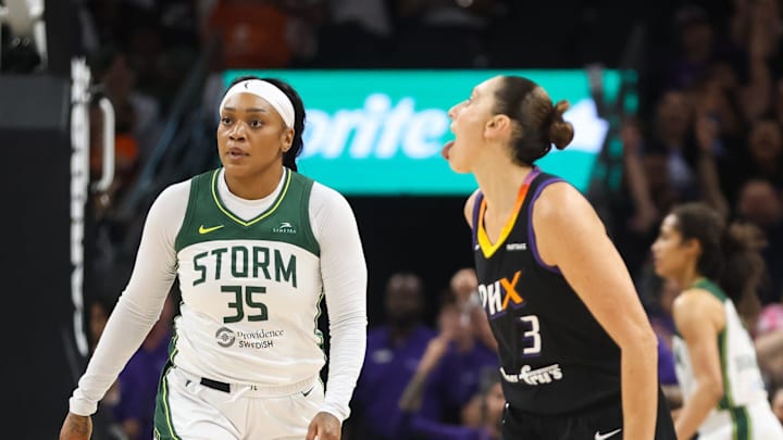Phoenix Mercury guard Diana Taurasi (3) sticks her tongue out at Seattle Storm guard Victoria Vivians (35) after hitting a three-pointer on Sept. 19, 2024 at Footprint Center in Phoenix.