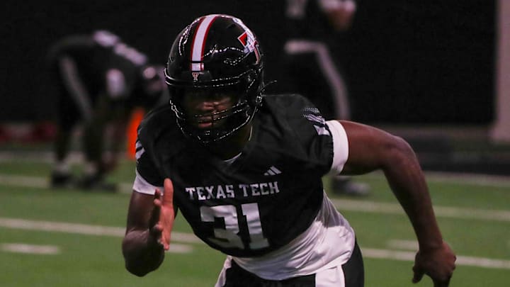 Stanford transfer David Bailey goes through a drill during Texas Tech's spring football practice