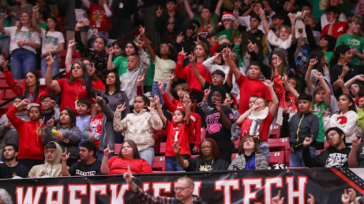 Students cheer during Texas Tech's annual Education Day in a non-conference basketball game.