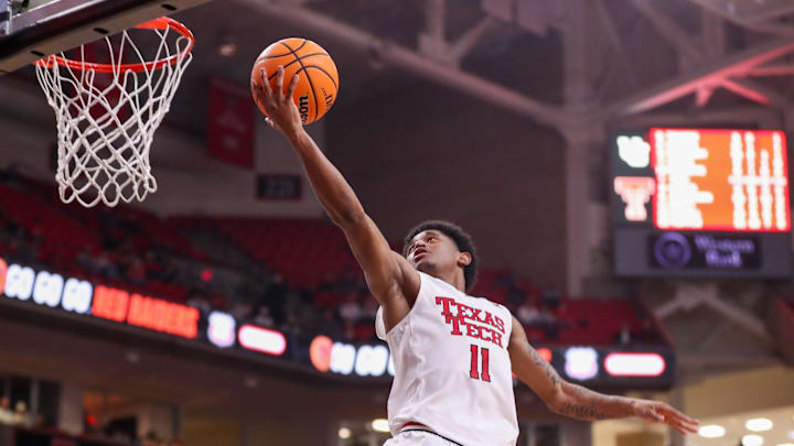 Texas Tech's Jaylen Petty goes up for a layup during a Big 12 Conference men's basketball game.