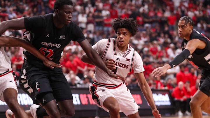 Texas Tech's Christian Anderson dribbles against Cincinnati defender Moustapha Thiam during a Big 12 Conference men's basketball game, Tuesday, Feb. 24, 2026, in United Supermarkets Arena. Texas Tech's Christian Anderson dribbles against Cincinnati defender Moustapha Thiam during a Big 12 Conference men's basketball game, Tuesday, Feb. 24, 2026, in United Supermarkets Arena.