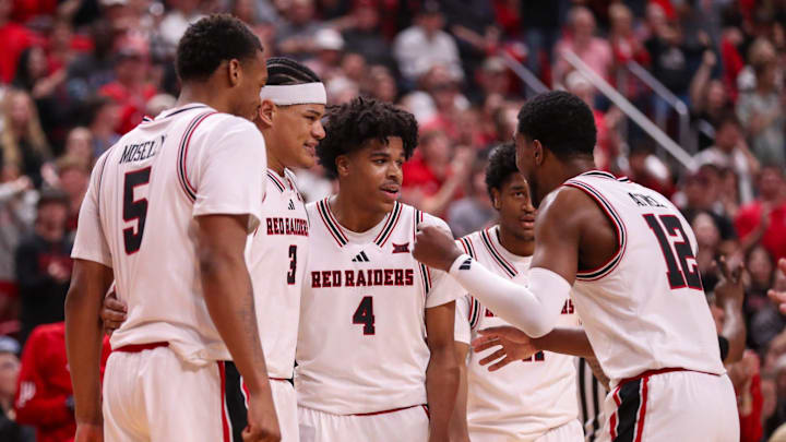Texas Tech players Josiah Moseley (5), LeJuan Watts (3), Christian Anderson (4), Jaylen Petty (hidden) and Donovan Atwell huddle up after a foul call during a Big 12 Conference men's basketball game, Tuesday, Feb. 24, 2026, in United Supermarkets Arena.