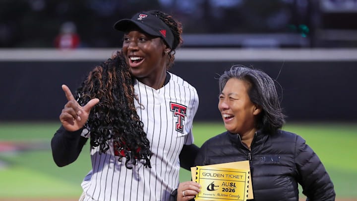 Texas Tech's NiJaree Canady receives a golden ticket to the 2026 draft from AUSL commissioner Kim Ng, Friday, March 27, 2026, at Tracy Sellers Field. Texas Tech's NiJaree Canady receives a golden ticket to the 2026 draft from AUSL commissioner Kim Ng, Friday, March 27, 2026, at Tracy Sellers Field.