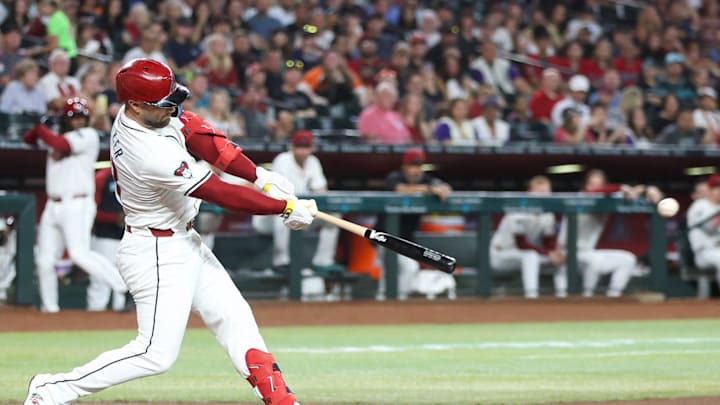 Arizona Diamondbacks first base Christian Walker (53) hits a single to drive in a run on Sept. 15, 2024, at Chase Field in Phoenix.