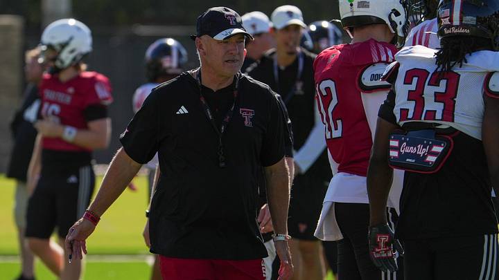 Texas Tech head coach Joey McGuire walks the field during football practice, Tuesday, Aug. 18, 2026, at the Womble Football Center. Texas Tech head coach Joey McGuire walks the field during football practice, Tuesday, Aug. 18, 2026, at the Womble Football Center.