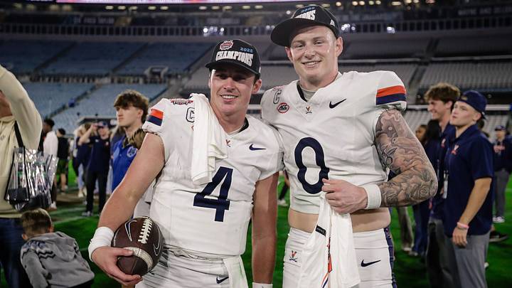 Dec 27, 2025; Jacksonville, FL, USA; Virginia Cavaliers quarterback Chandler Morris (4) poses for a photo with tight end Sage Ennis (0) after defeating the Missouri Tigers at EverBank Stadium. Mandatory Credit: Travis Register-Imagn Images Dec 27, 2025; Jacksonville, FL, USA; Virginia Cavaliers quarterback Chandler Morris (4) poses for a photo with tight end Sage Ennis (0) after defeating the Missouri Tigers at EverBank Stadium. Mandatory Credit: Travis Register-Imagn Images