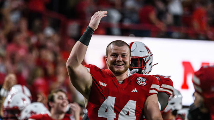 Defensive lineman, Riley Van Poppel, celebrates Nebraska's fumble recovery. 