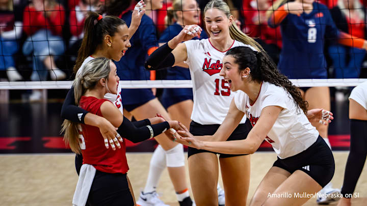 Virginia Adriano, right, high fives Laney Choboy after a kill. The Huskers face their toughest stretch of the season with four of their next five matches on the road. Virginia Adriano, right, high fives Laney Choboy after a kill. The Huskers face their toughest stretch of the season with four of their next five matches on the road.
