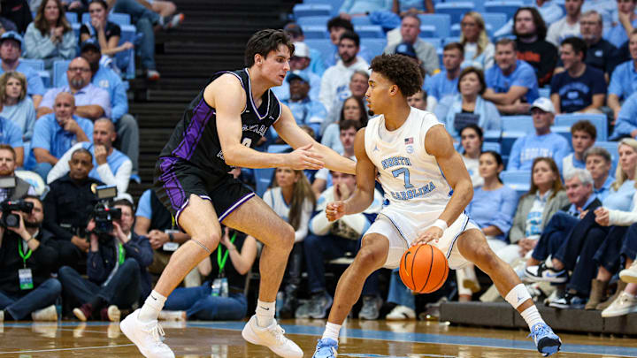 Seth Trimble attempting to get by a defender during North Carolina's 94-54 win over Central Arkansas; Nov. 3, 2025