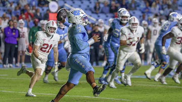 North Carolina quarterback Gio Lopez attempting to throaw a pass during Tar Heels' 20-15 win over Stanford on Nov. 8, 2025.