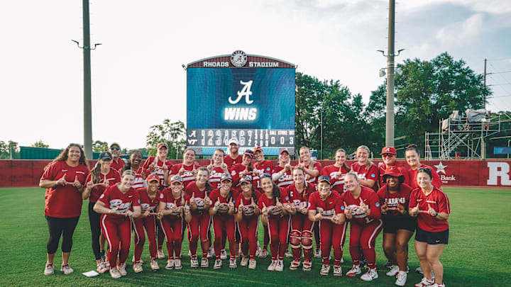 Alabama softball team after beating Virginia Tech to advance to Supers