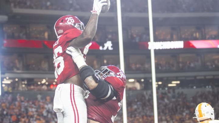 Jam Miller (26) and Kadyn Proctor (74).