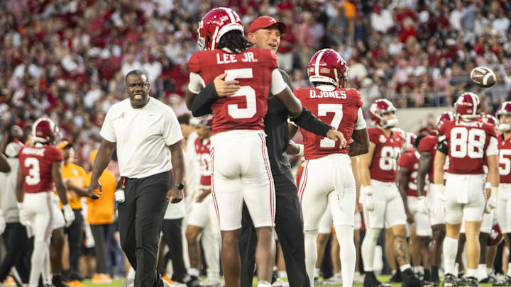 Kalen DeBoer hugs Alabama DB Dijon Lee in warmups Kalen DeBoer hugs Alabama DB Dijon Lee in warmups