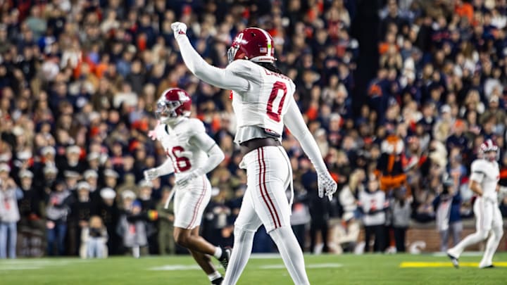 Alabama linebacker Deontae Lawson celebrates forcing an Auburn punt in the first half of the Iron Bowl on November 29, 2025. Alabama linebacker Deontae Lawson celebrates forcing an Auburn punt in the first half of the Iron Bowl on November 29, 2025.