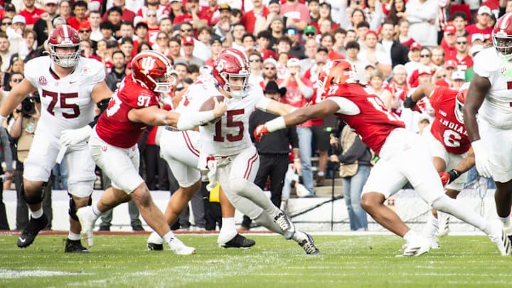 Alabama quarterback Ty Simpson hits the Heisman pose to avoid a tackle in the first half of the Rose Bowl on Jan. 1, 2026.