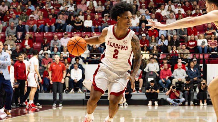 Alabama guard Aden Holloway dribbles the ball in the first half of the game against Texas on Jan. 10, 2025.