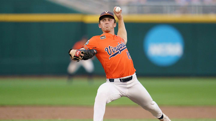 Evan Blanco delivers a pitch during the Virginia baseball game at the College World Series in Omaha. Evan Blanco delivers a pitch during the Virginia baseball game at the College World Series in Omaha.
