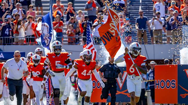 The Virginia Cavaliers take the field ahead of the UVA football game against Boston College at Scott Stadium. The Virginia Cavaliers take the field ahead of the UVA football game against Boston College at Scott Stadium.