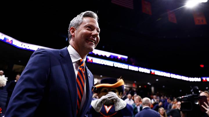 Ryan Odom walks out for his introductory press conference as Virginia men's basketball head coach at John Paul Jones Arena.