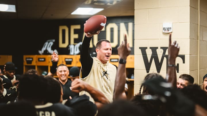 Head Coach Jake Dickert celebrates his first win at Wake Forest in the locker room. Head Coach Jake Dickert celebrates his first win at Wake Forest in the locker room.