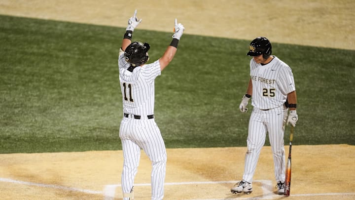 Luke Costello celebrates as he crosses home plate in Wake Forest's win over Coastal Carolina on April 14. 