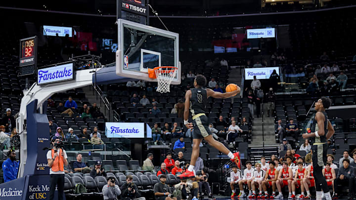 St. John Bosco’s Brandon McCoy throws down a windmill dunk against Mater Dei at the Intuit Dome on Saturday, Feb. 1, 2025.