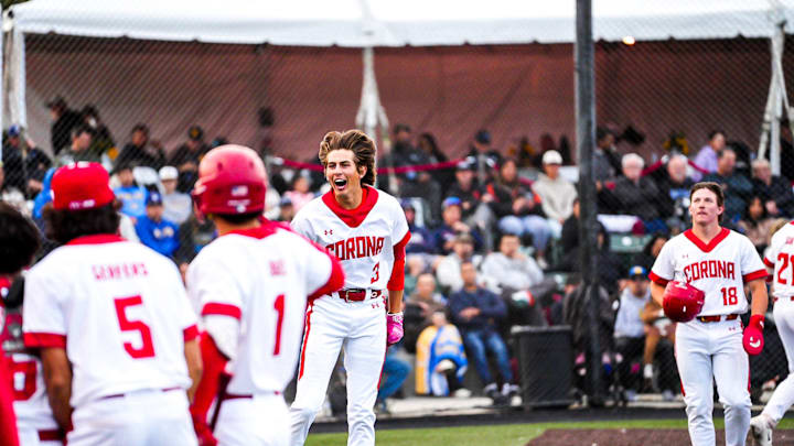 Corona High's Billy Carlson (3) celebrates after rounding the bases from a home run against La Mirada in the Boras Classic final