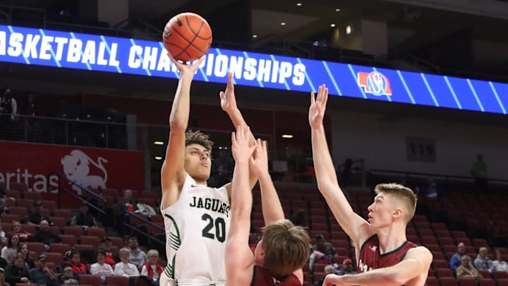 Going Out On Top: In addition to excelling on the basketball court and in the classroom, Andre Martin is leaving a lasting legacy in high school at Howells-Dodge. 