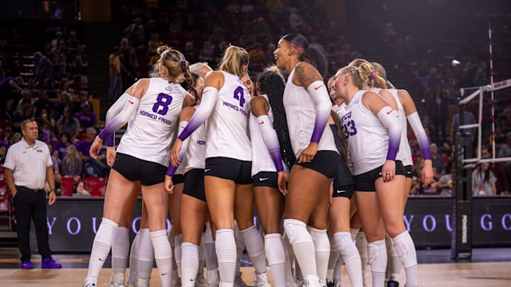 TCU Volleyball players huddle in their match against No. 6 Arizona State in Tempe, Arizona.