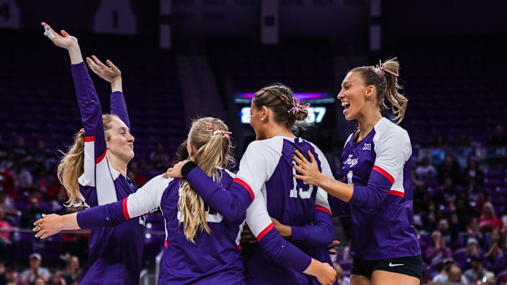 TCU Volleyball players celebrate a point scored against Texas Tech.