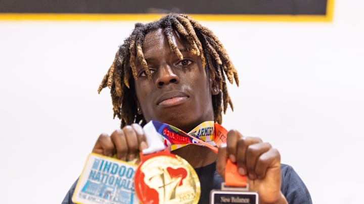 Missouri Track and Field sophomore Sterling Scott poses with his medals that he has won over the past two years. 