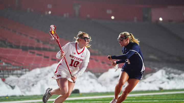 Rutgers women's lacrosse (2-1) defeated Monmouth (3-1), 20-5, on Wednesday night at SHI Stadium. The Scarlet Knights outscored the Hawks, 13-3, in the first half and used a 33-18 shot advantage to secure their second win of the season.