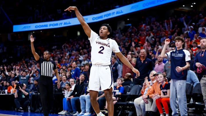 Reece Beekman shoots a three-pointer during the Virginia men's basketball game against Boston College at the ACC Tournament. Reece Beekman shoots a three-pointer during the Virginia men's basketball game against Boston College at the ACC Tournament.