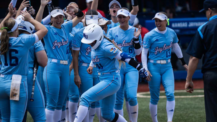 Pitching coach Laura Heberling has been promoted to associate head coach.