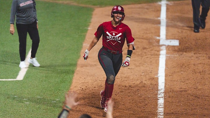 Alyssa Parker round third after hitting a home run during OU softball's Battle Series.
