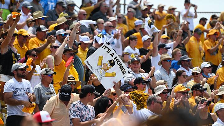 Southern Miss fans celebrating a homerun during regional play at Pete Taylor Park. Southern Miss fans celebrating a homerun during regional play at Pete Taylor Park.