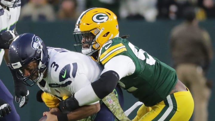 Green Bay Packers defender Rashan Gary sacks then-Seattle Seahawks quarterback during their game in 2021.