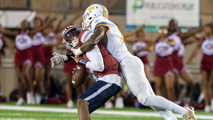 Park Crossing's Marcus Smith is sacked by Selma's Kristan Moore at Cramton Bowl in Montgomery, Ala. Park Crossing's Marcus Smith is sacked by Selma's Kristan Moore at Cramton Bowl in Montgomery, Ala.