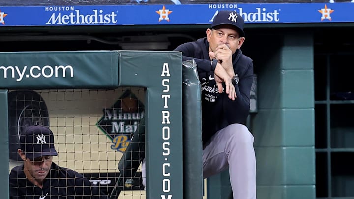 Mar 31, 2024; Houston, Texas, USA; New York Yankees manager Aaron Boone (17) watches the action from