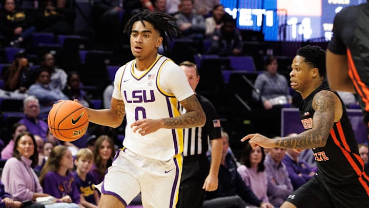 Nov 29, 2024; Baton Rouge, Louisiana, USA; LSU Tigers guard Vyctorius Miller (0) dribbles against the Northwestern State Demons during the first half at Pete Maravich Assembly Center. Mandatory Credit: Stephen Lew-Imagn Images Nov 29, 2024; Baton Rouge, Louisiana, USA; LSU Tigers guard Vyctorius Miller (0) dribbles against the Northwestern State Demons during the first half at Pete Maravich Assembly Center. Mandatory Credit: Stephen Lew-Imagn Images